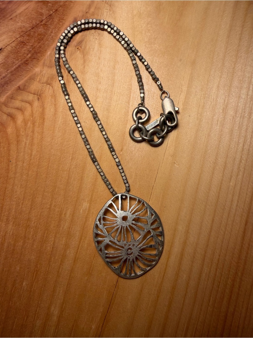 Vintage Kenneth Cole Silver Floral Cutout Pendant Necklace